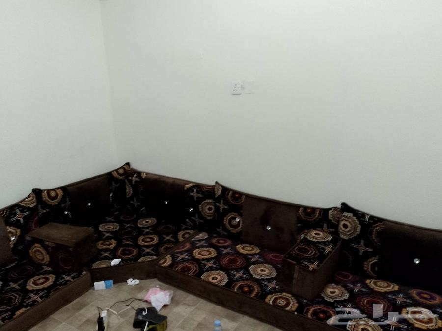 Clean floor sofa for sale with 5 pillows, approximate size 4 by 464222543497089112
