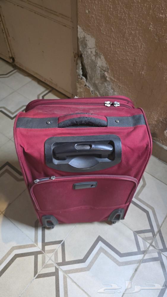 A small travel bag and a board64228571758337113