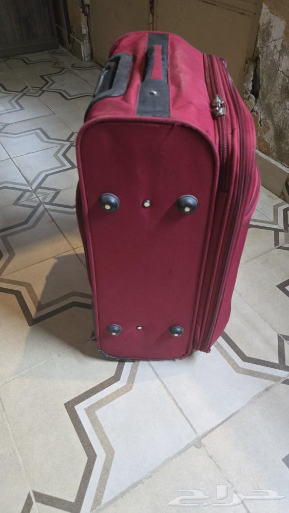 A small travel bag and a board64228571758337112