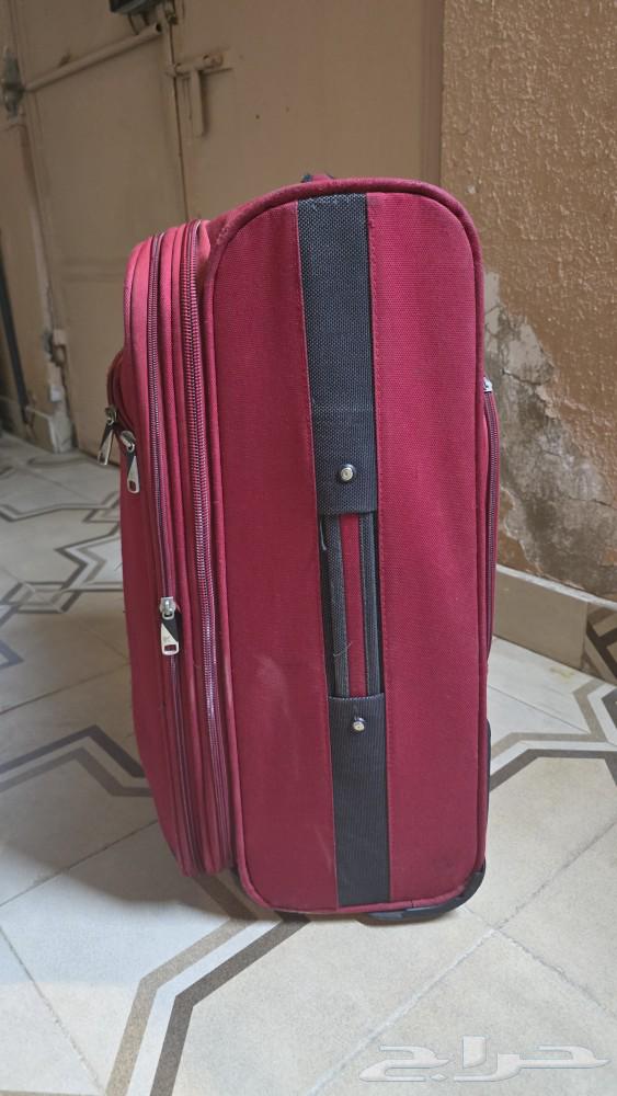 A small travel bag and a board64228571758337114