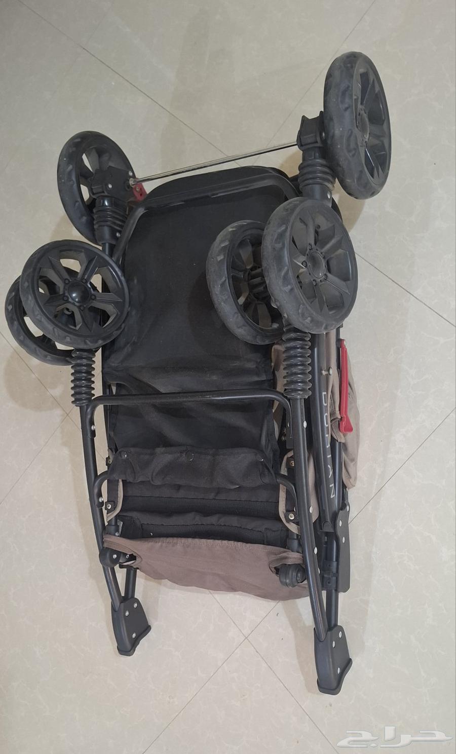 عربه اطفال من جونيور فيها حامل كواب استعمال نظيف64218617873153110