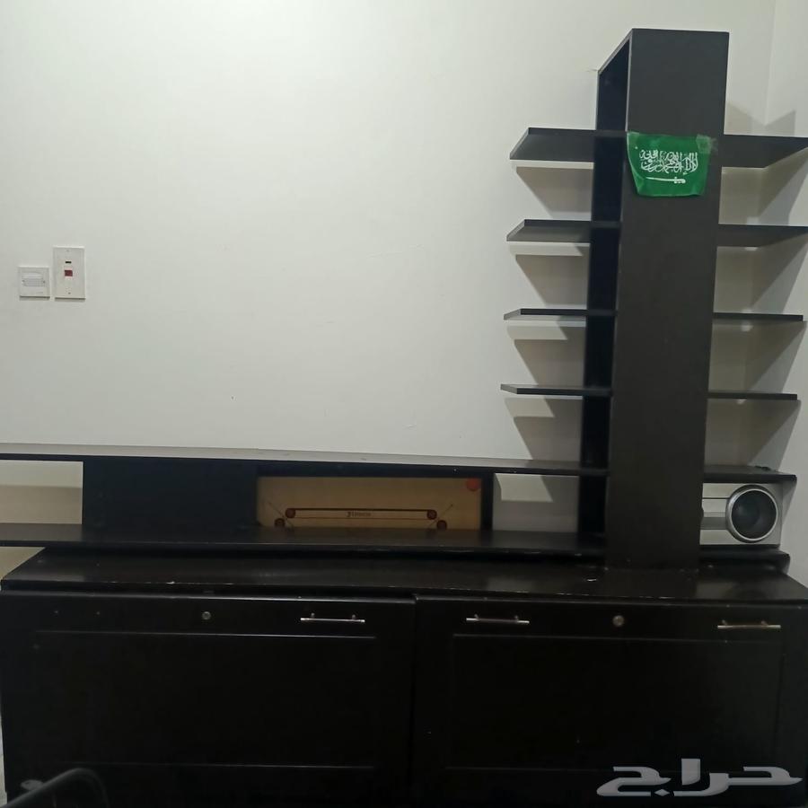 L-shaped sofa and clean cabinet with no defects64240068670978112