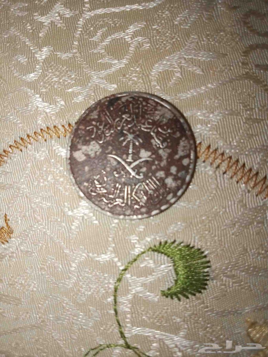 A metallic coin from the era of King Faisal in 139264239534467203111