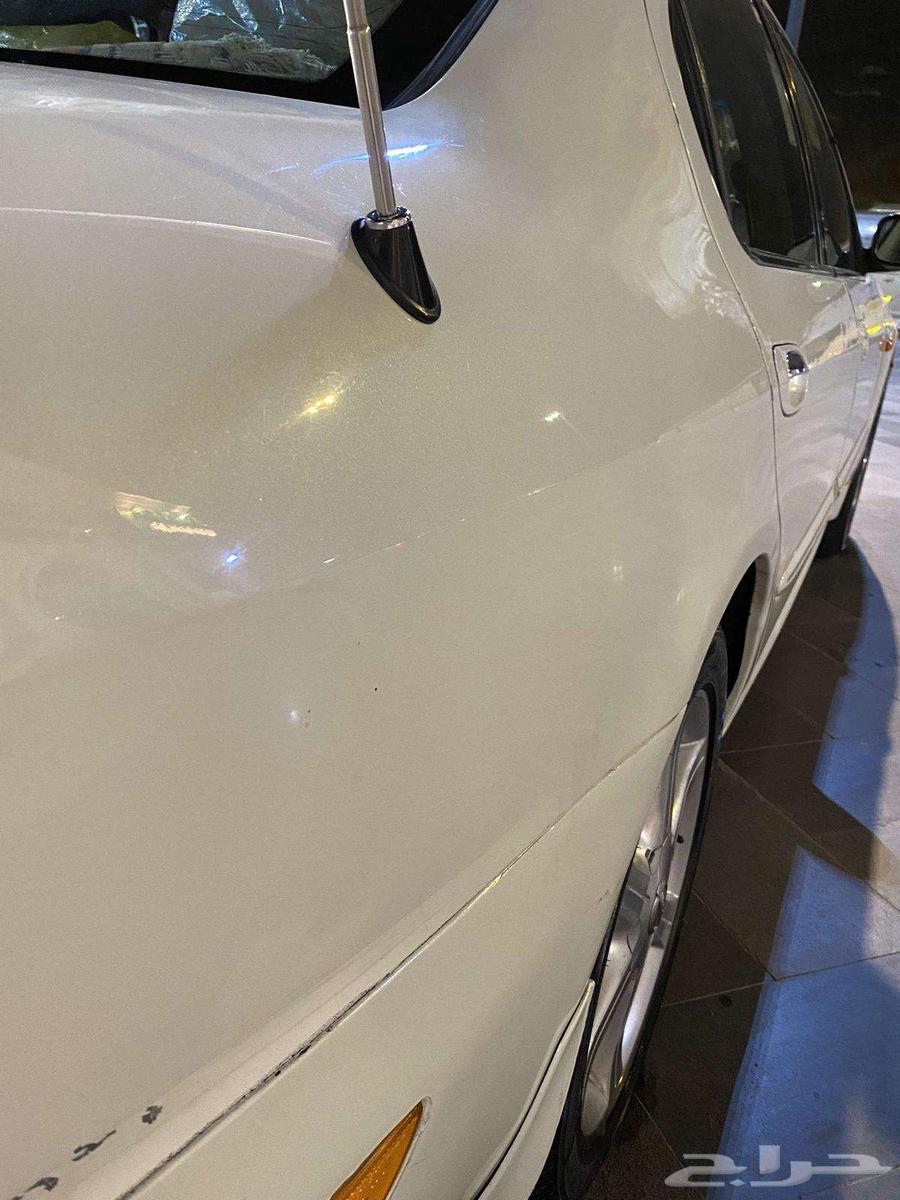 Maxima 2005 full option, sunroof, automatic transmission, and chrome rims64466432252930114