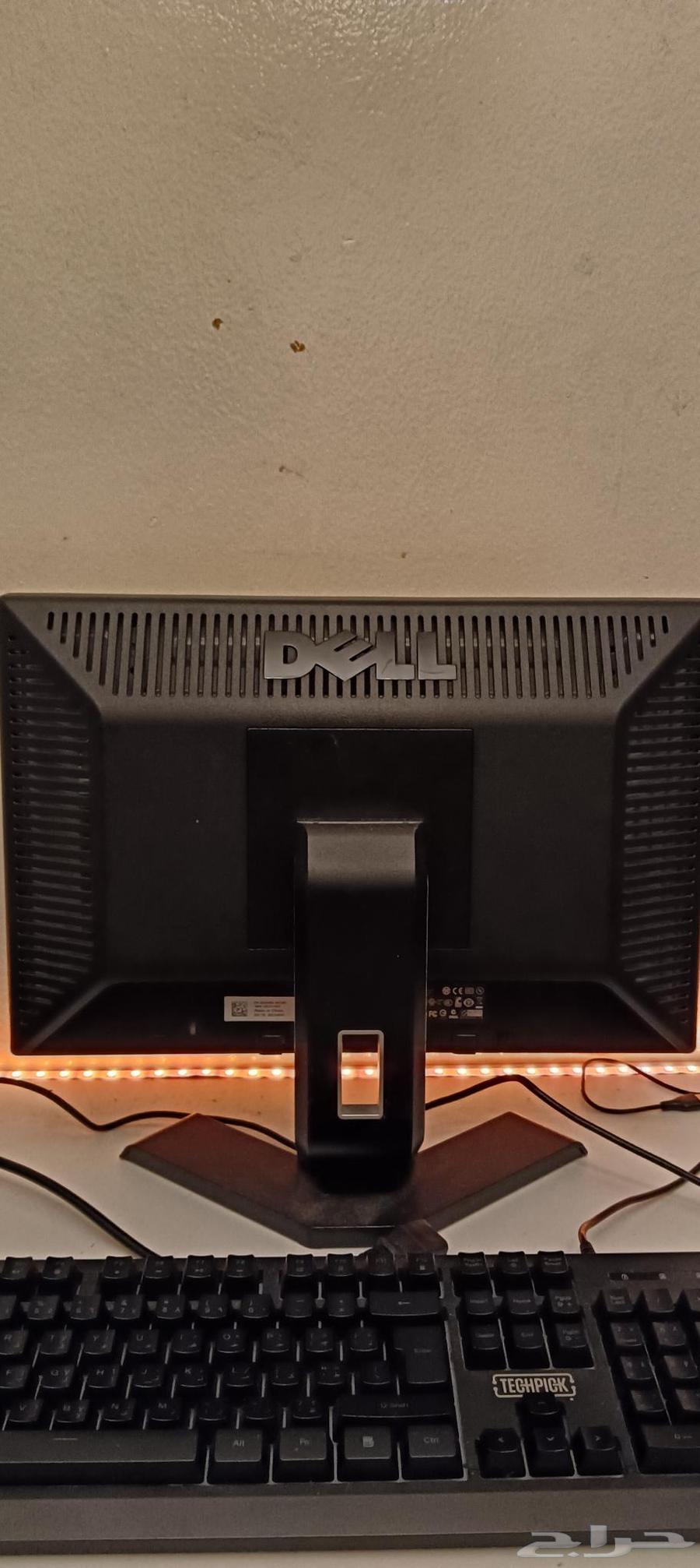 Three computer monitors64346014566657112