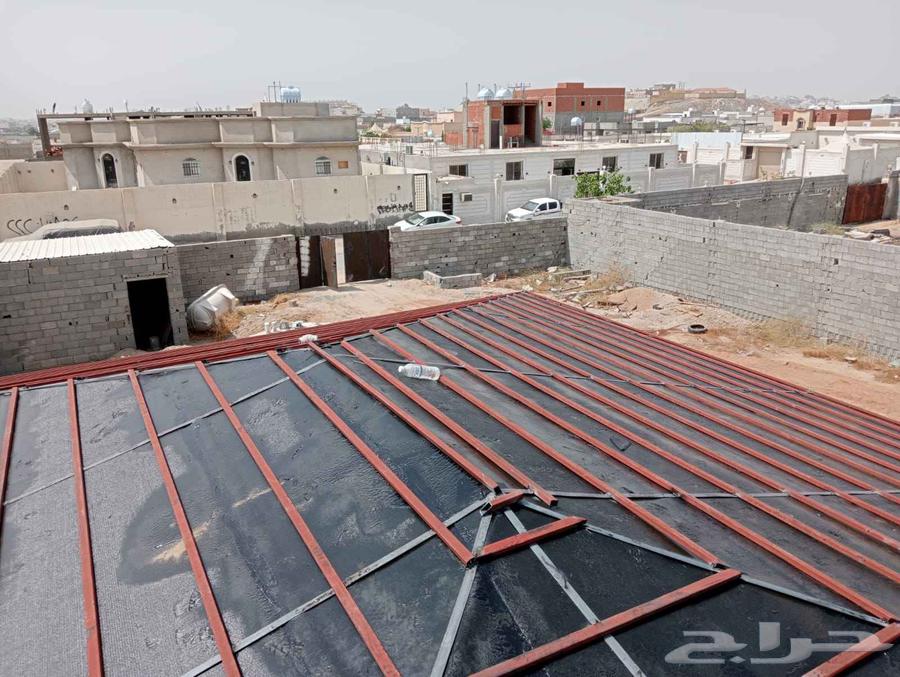 Ceramic and metal roofing technician with insulation63617357018625114