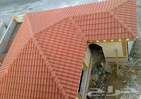 Ceramic and metal roofing technician with insulation63617357018625112