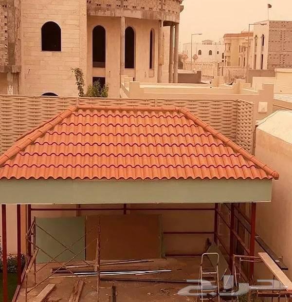 Ceramic and metal roofing technician with insulation63617357018625111