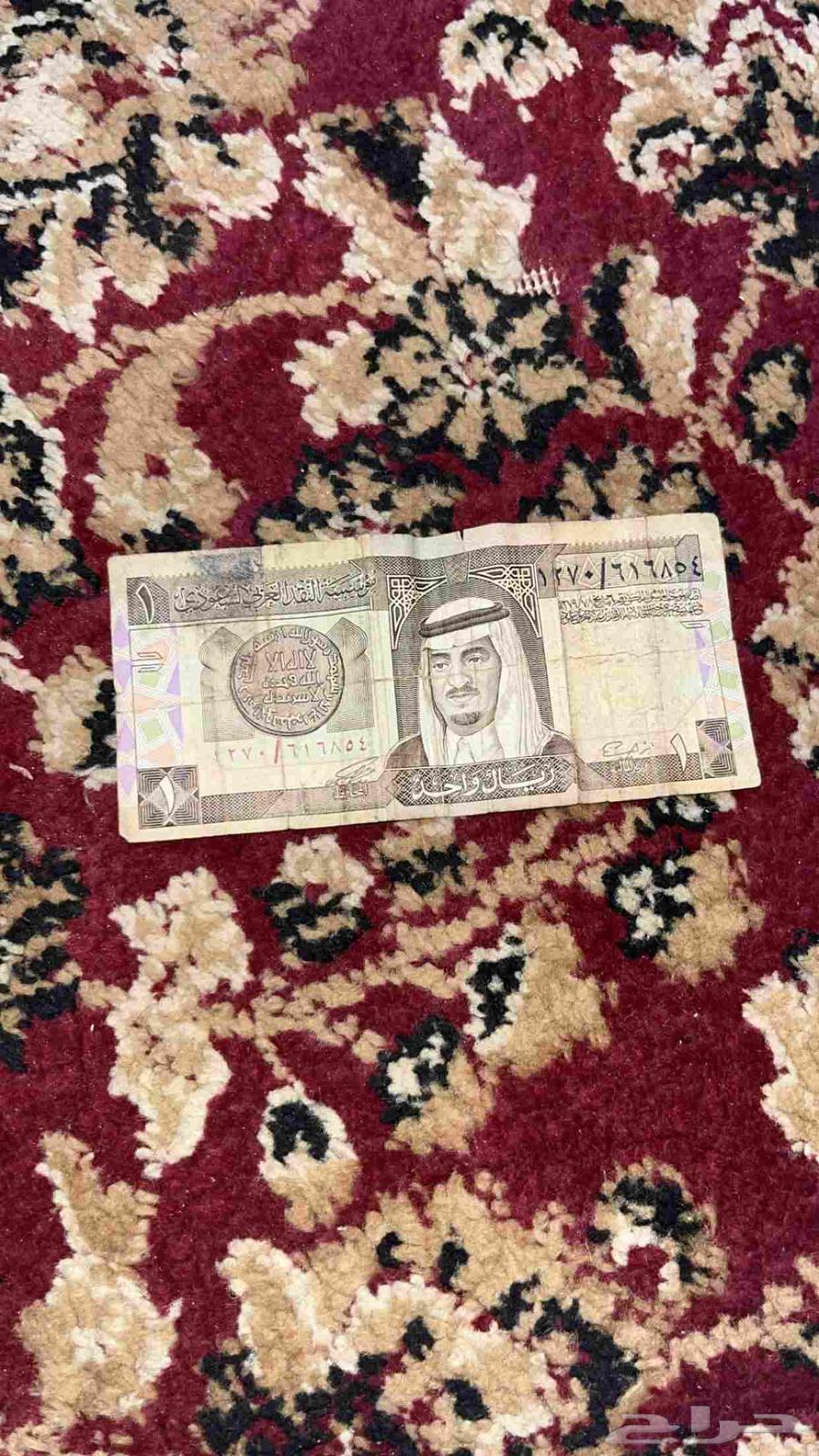 King Fahd's riyal and King Abdullah's riyal on Asom from 10064372682731779110