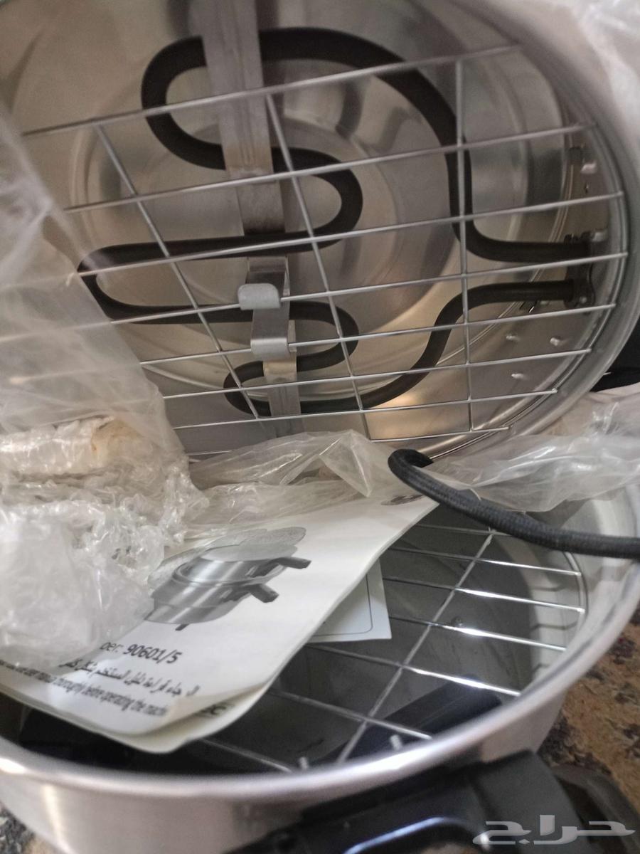 خبازة منزلي   صانعه دونات64371452488834112