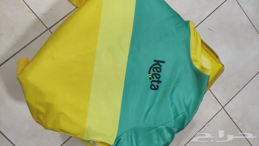 A Kita bag with two blankets, one is semi-new and one is slightly worn64371481759489111