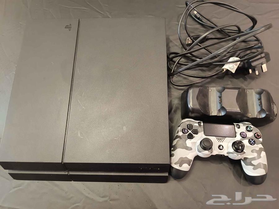 بلاي ستيشن 4 مستخدم مع يد اصليه وقاعده شحن64366468594307110