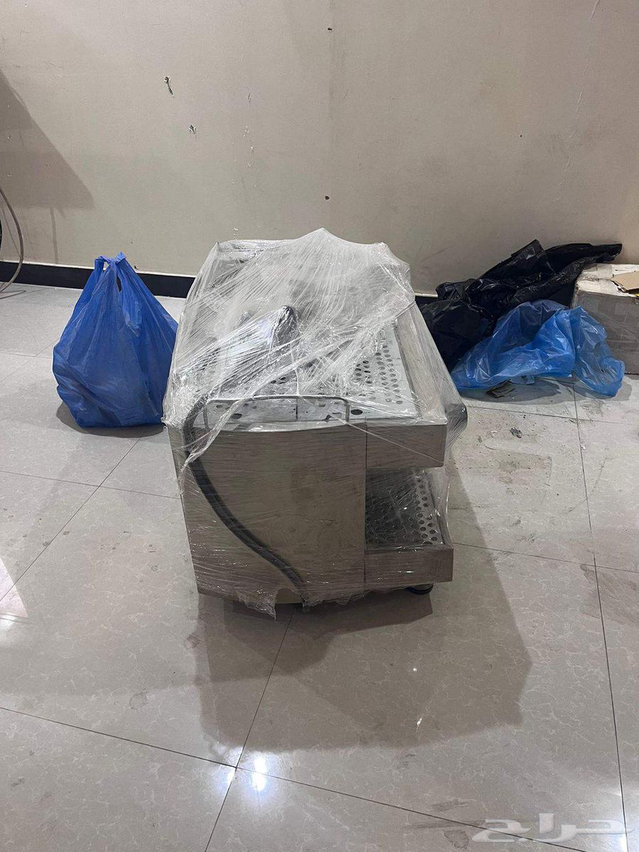 صانعة قهوة64391604698242110