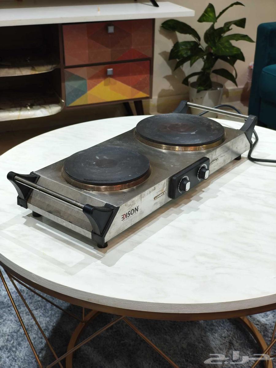 موقد كهربائي و طاولة64382983811329113