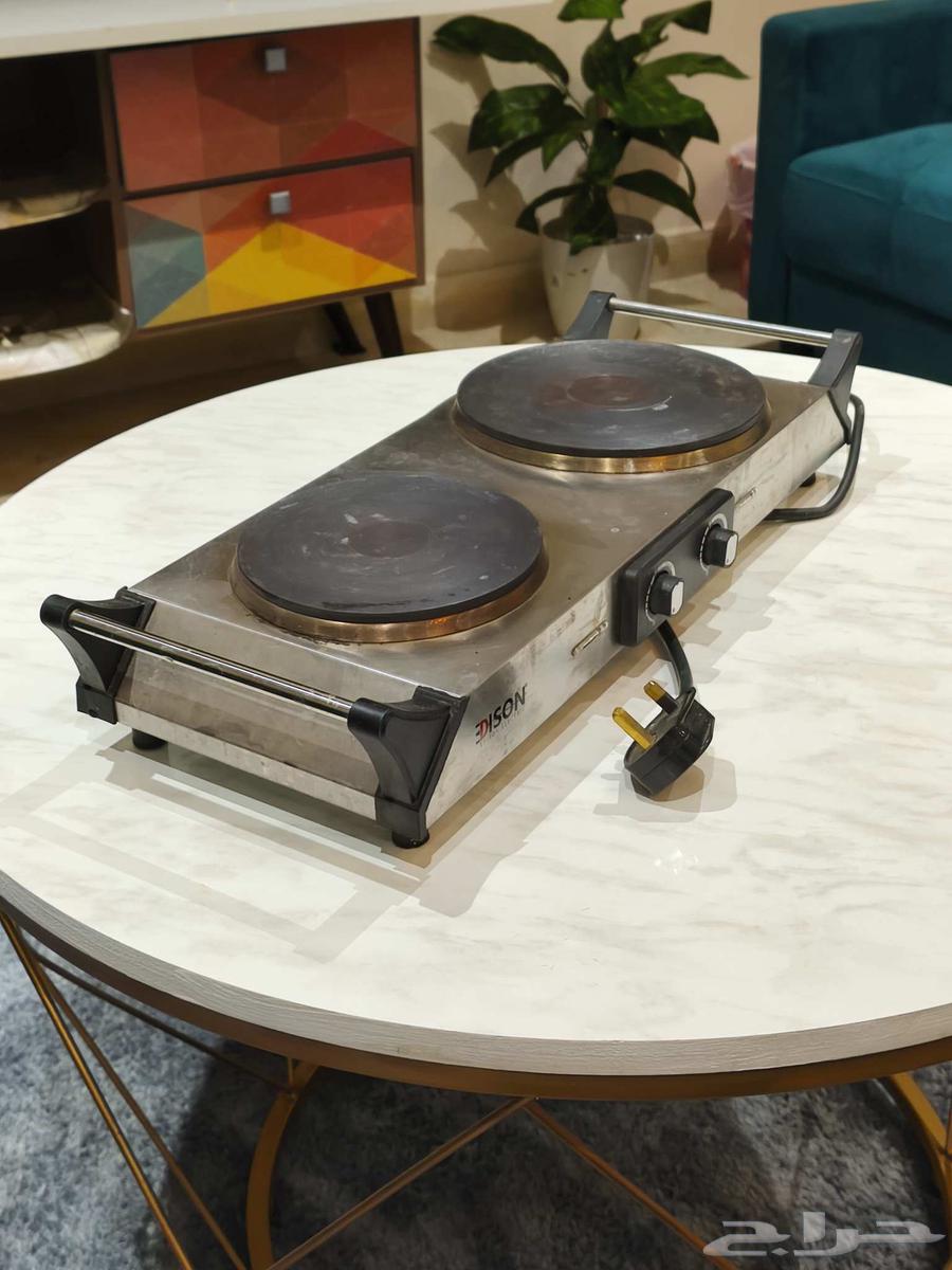 موقد كهربائي و طاولة64382983811329114