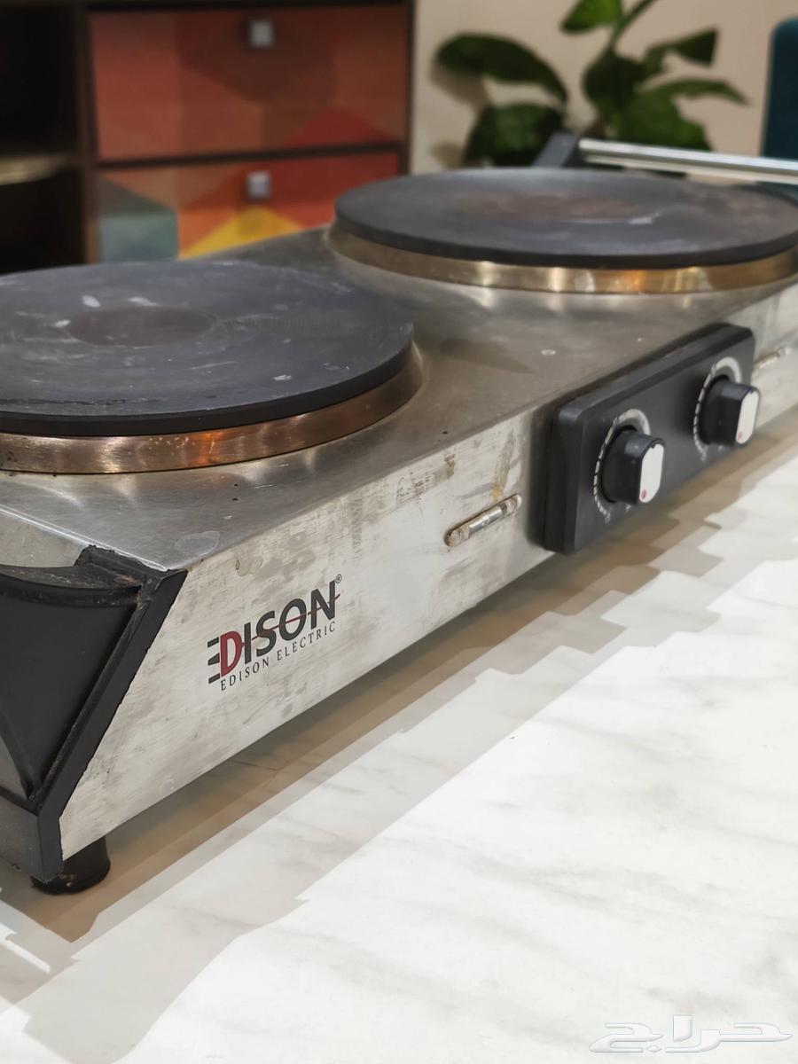 موقد كهربائي و طاولة64382983811329112