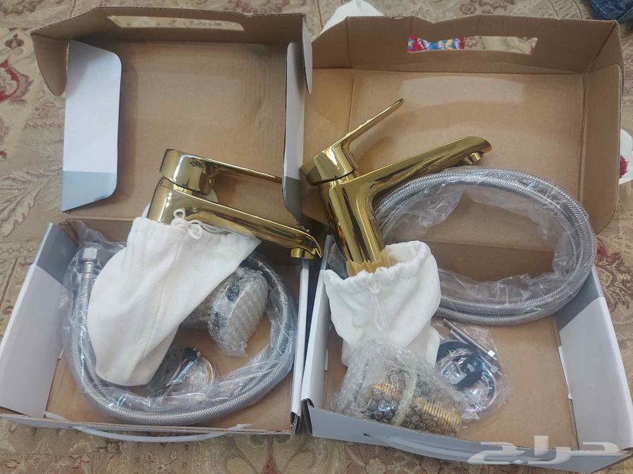 غسلتين رخام لونها ابيض وذهبي جديده على الشرط مع محابسها لونه64388894753666110