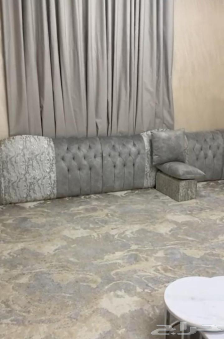 Arabic majlis with carpet and tables64378440391042112