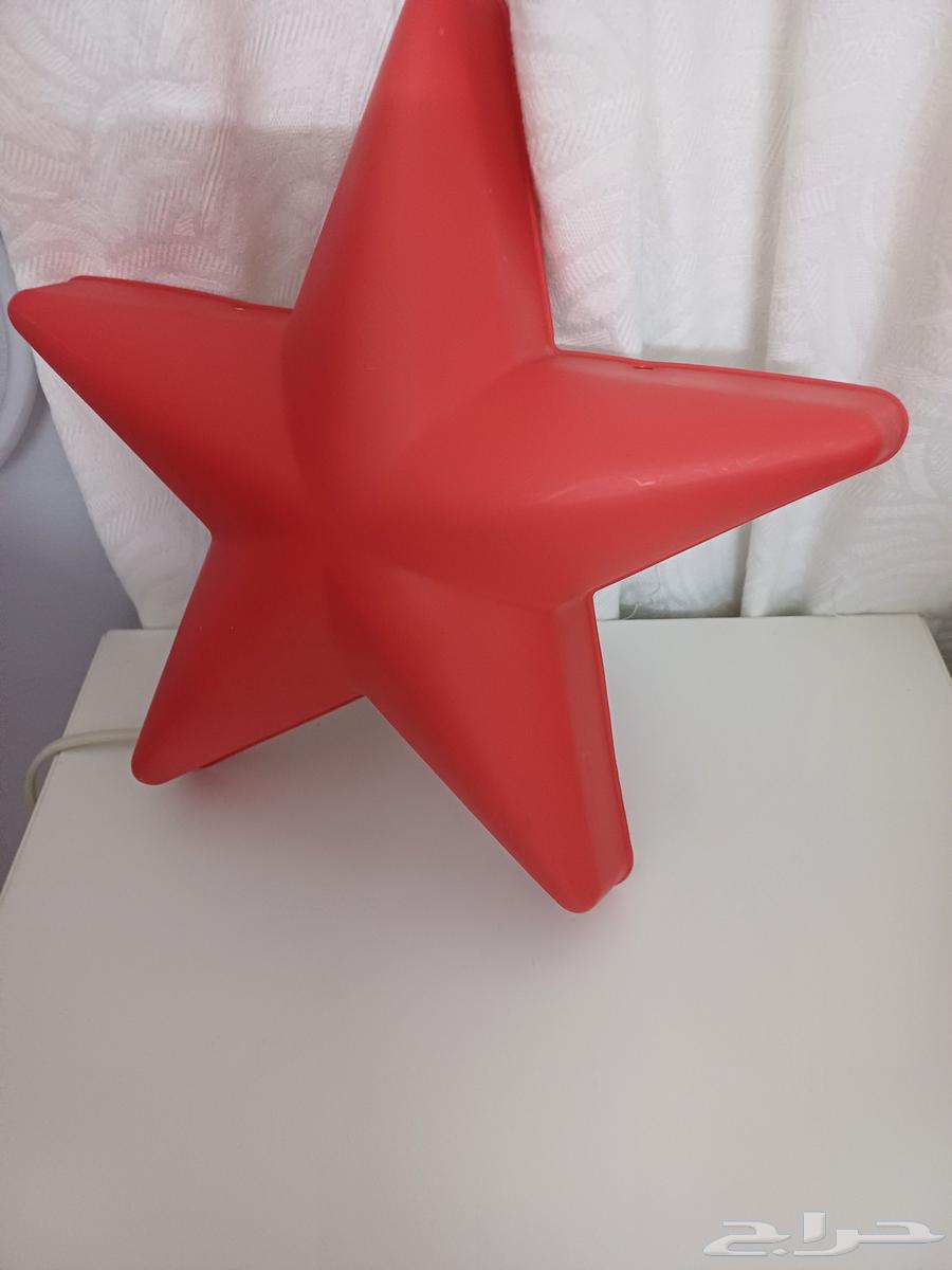 A toy and a lamp from Home Center..64400563520129113