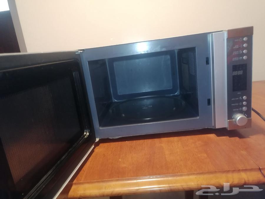 أغراض للبيع   غسالة 12 كيلو و ميكرويف 30 لتر64401008229635114