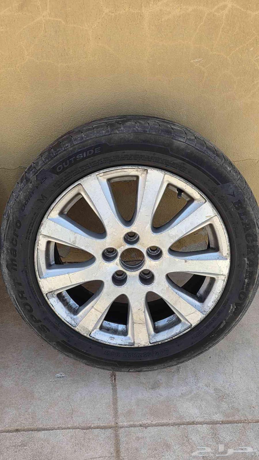 Orient 2009 17-inch rims with four Chinese tires with half life left63618249730178111