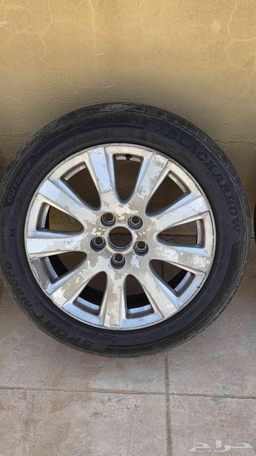 Orient 2009 17-inch rims with four Chinese tires with half life left63618249730178114