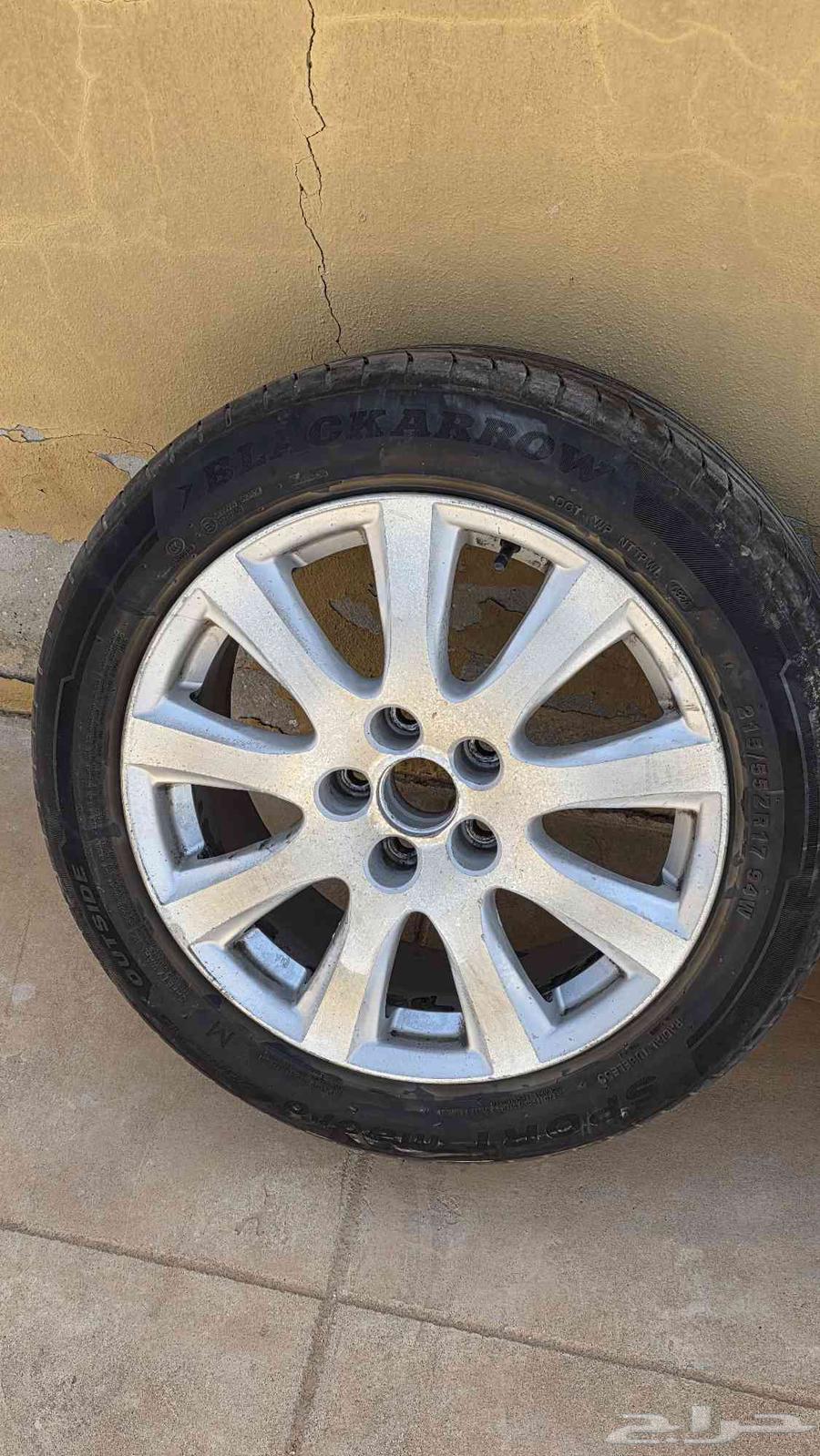Orient 2009 17-inch rims with four Chinese tires with half life left63618249730178112
