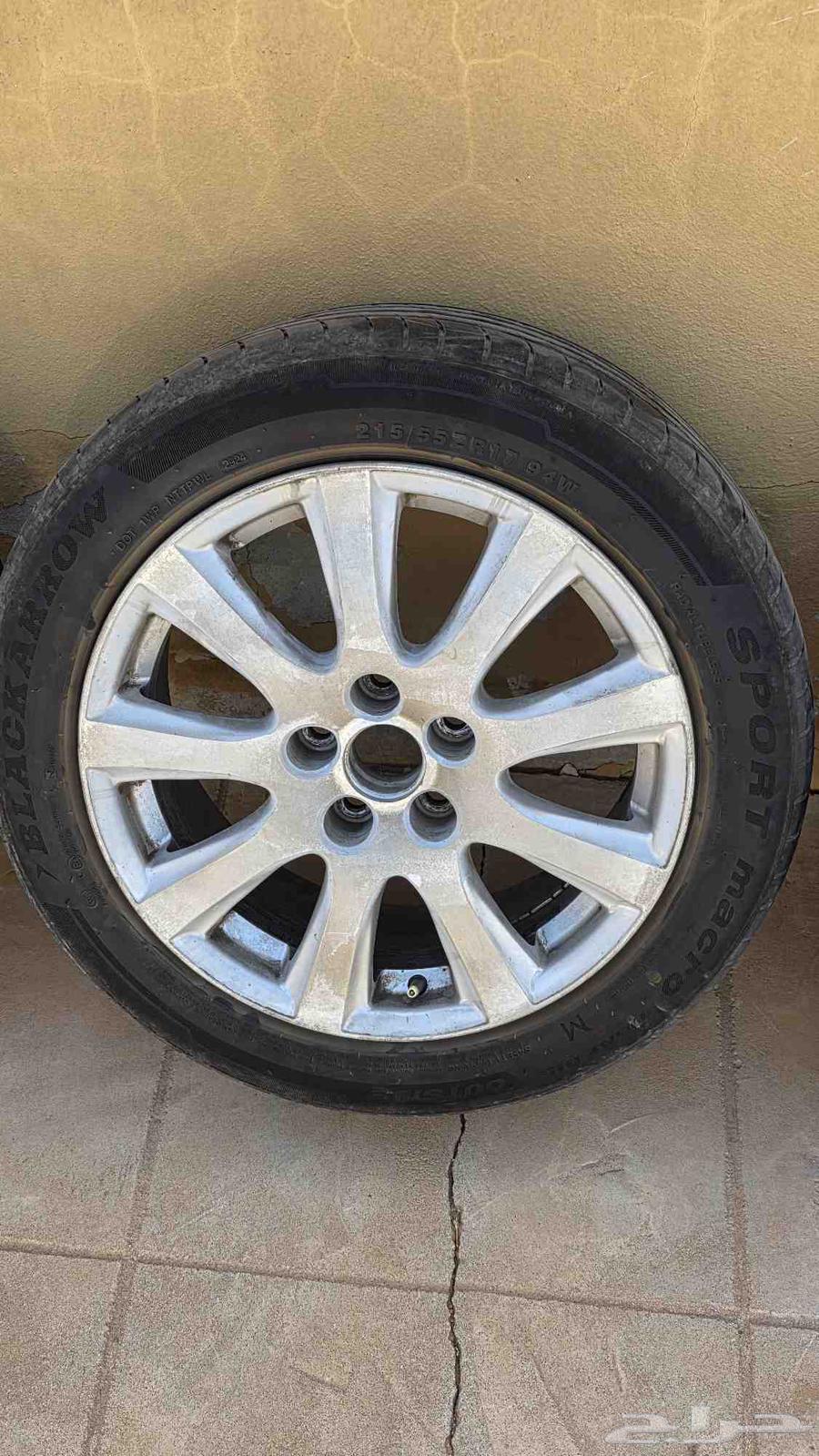 Orient 2009 17-inch rims with four Chinese tires with half life left63618249730178113