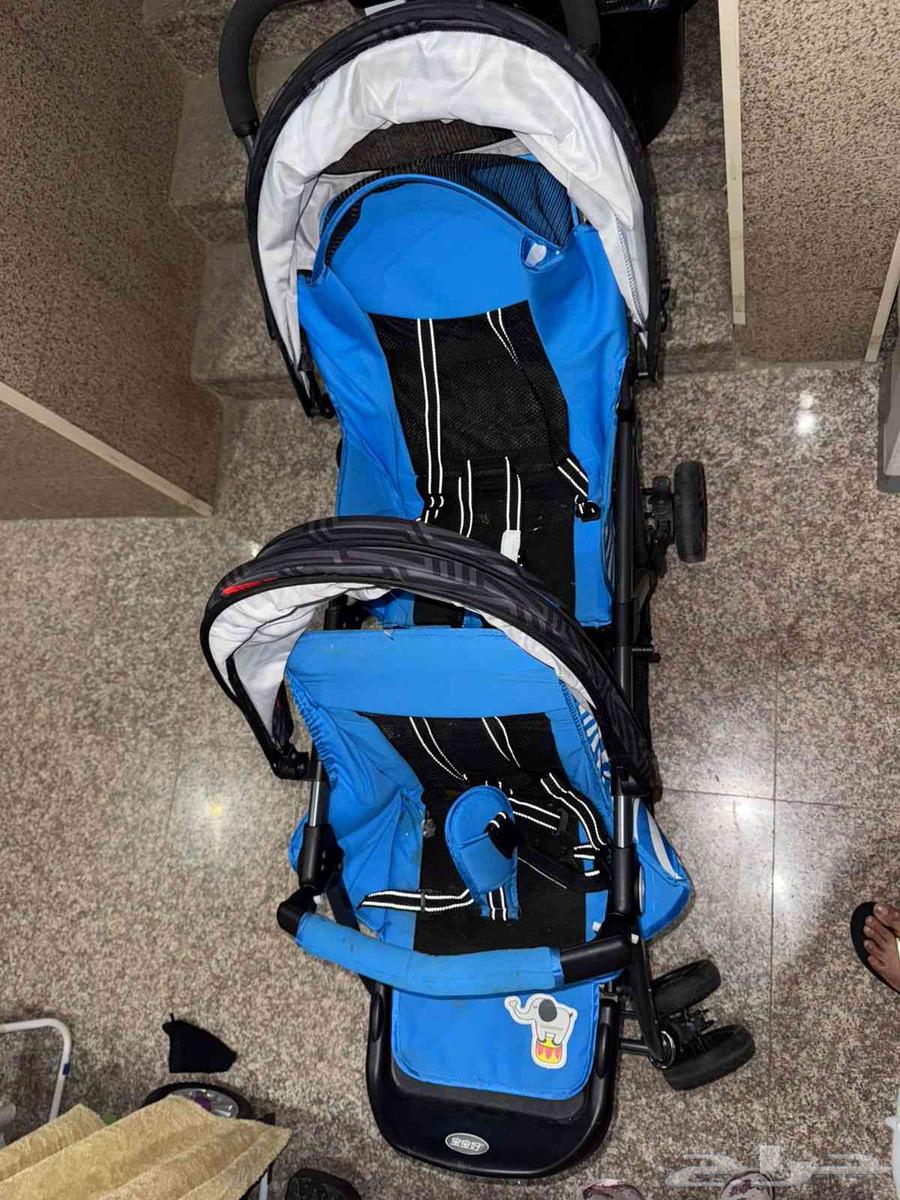 عربة أطفال مزدوجة (للأمام والخلف)64402523401601110