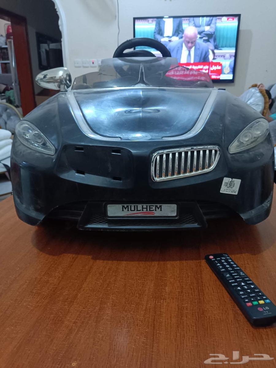 سيارة أطفال فيها للبطاريه والشاحن ولكن فيها عطل كهربائي لا ت64403378061826110