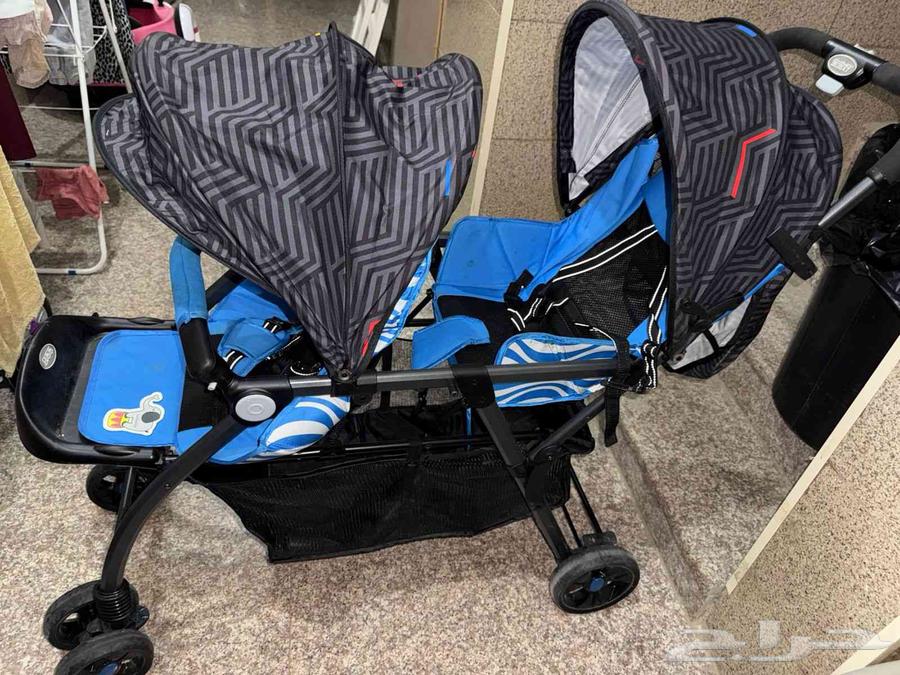 عربة أطفال مزدوجة (للأمام والخلف)64402523401601111