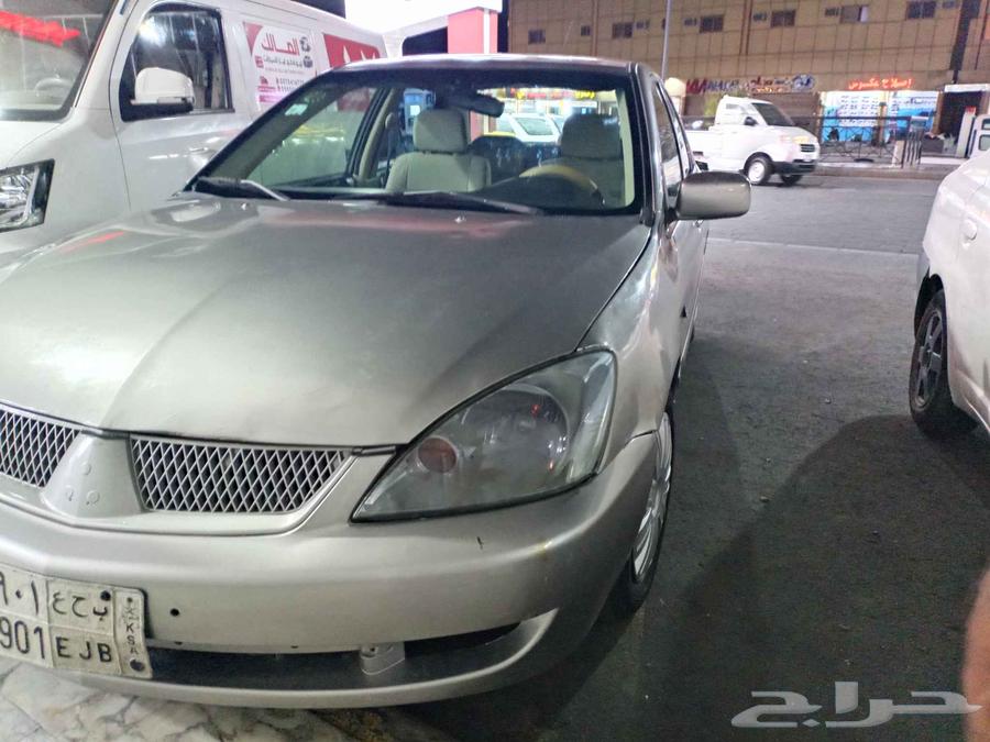 Mitsubishi Lancer 2009 model for sale, mileage 500, automatic transmission, glass63618267741058111