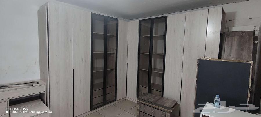 دولاب 10 درفه مع جزامه جانبيه منها اربع درفات زجاج عسلي64402761968897111