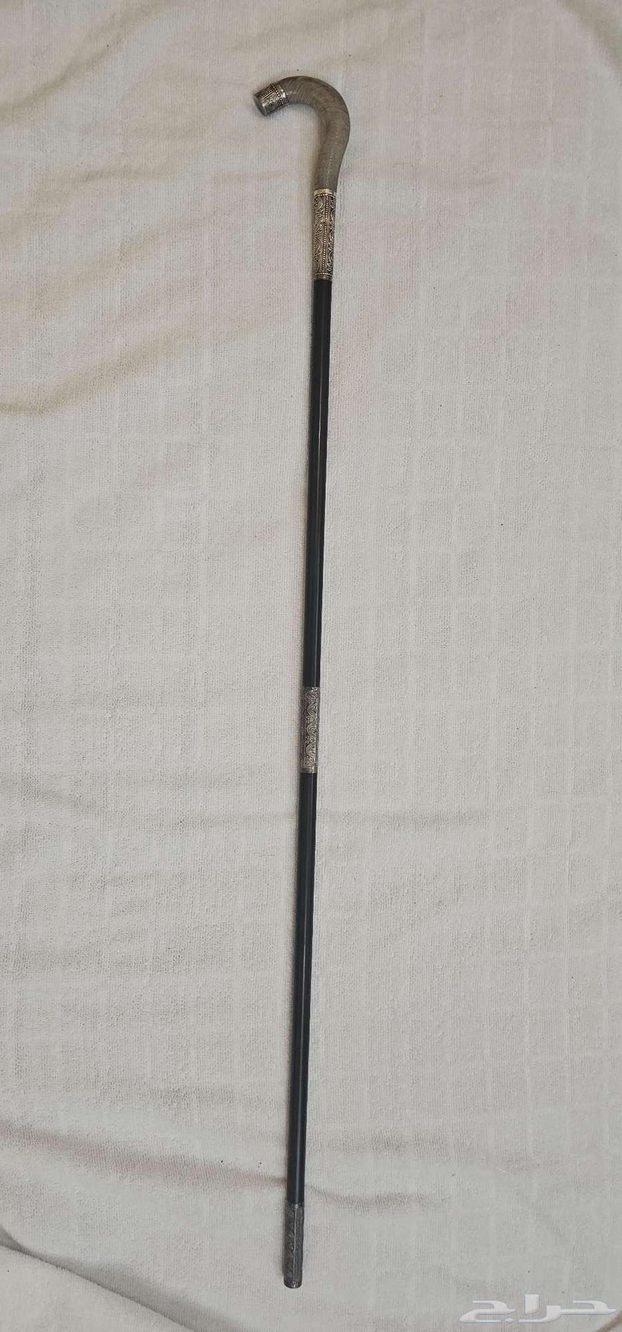 عصا عكاز خشب ابانوس مطعمة بالفضة شغل عماني64403986279809114