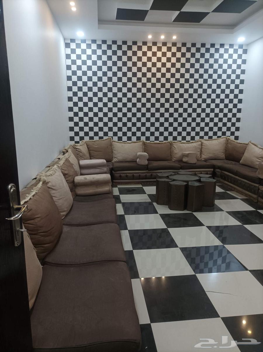 Living room sofa with used service tables in good condition64469445733121110