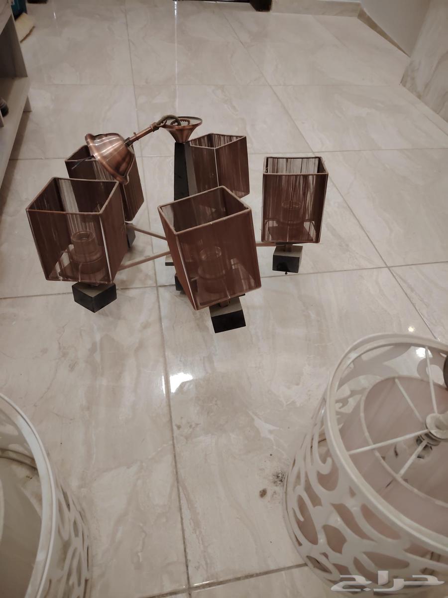 Table, screen, chandeliers, and electric oven64474790649090113