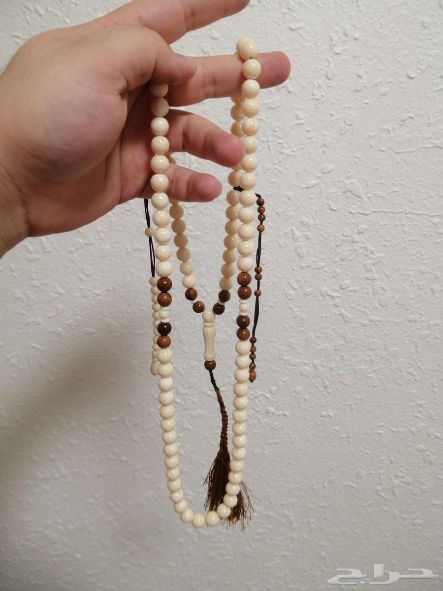 سبحة كهرمان لون عاجي مطعمة بكوك بني اصلي (جديدة) حبة كبيرة.64475266930305111
