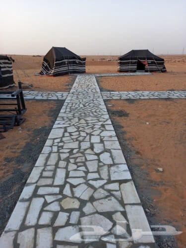 Installation of random white and yellow stone, paving, marble, and stone seating64214576230531112