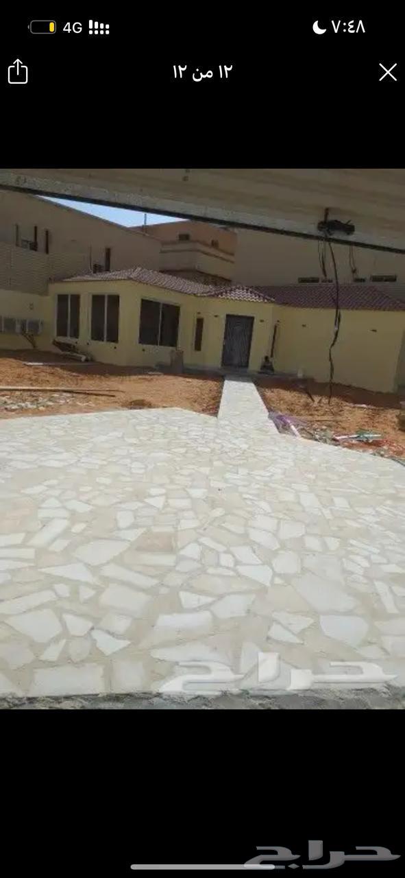 Installation of random white and yellow stone, paving, marble, and stone seating64214576230531111