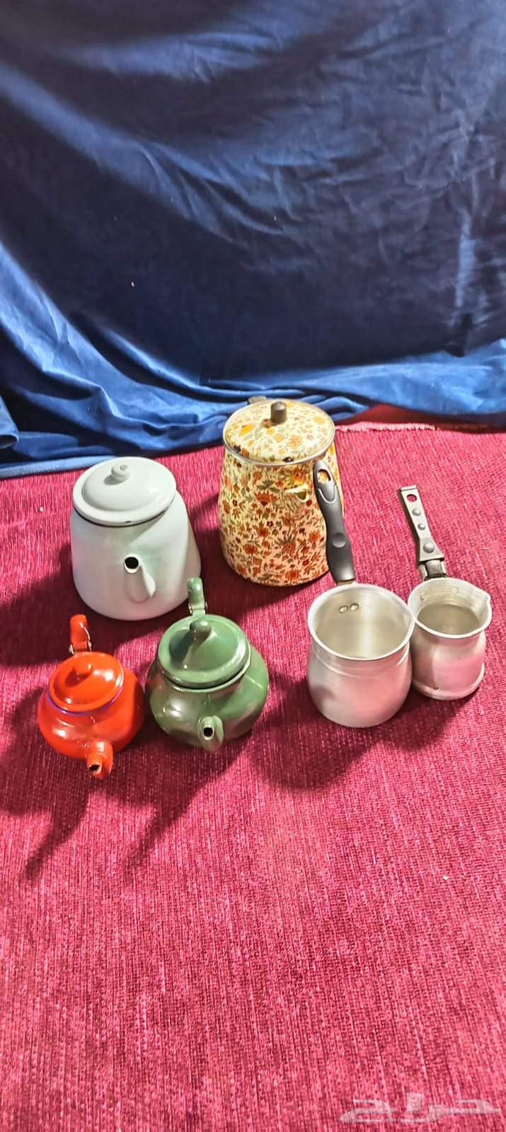 Vintage decorative pots, pitchers, and two stands64472172626945110