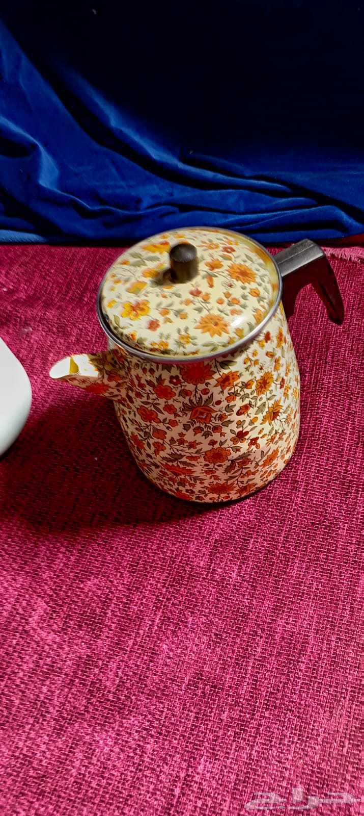 Vintage decorative pots, pitchers, and two stands64472172626945113