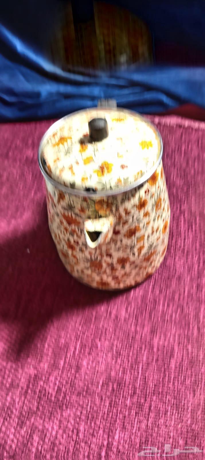 Vintage decorative pots, pitchers, and two stands64472172626945114