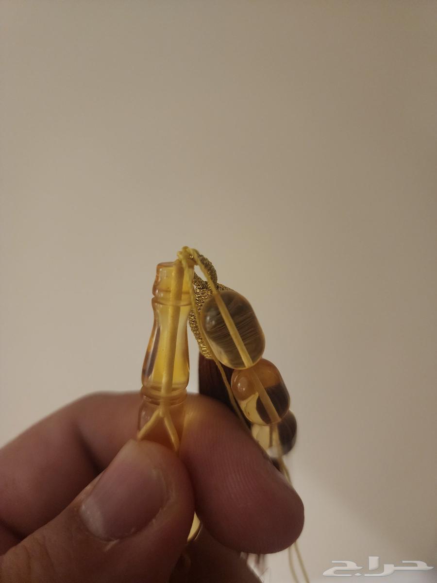 A set of prayer beads (transparent amber, qalalit, horn, tiger's eye)64480194590979111