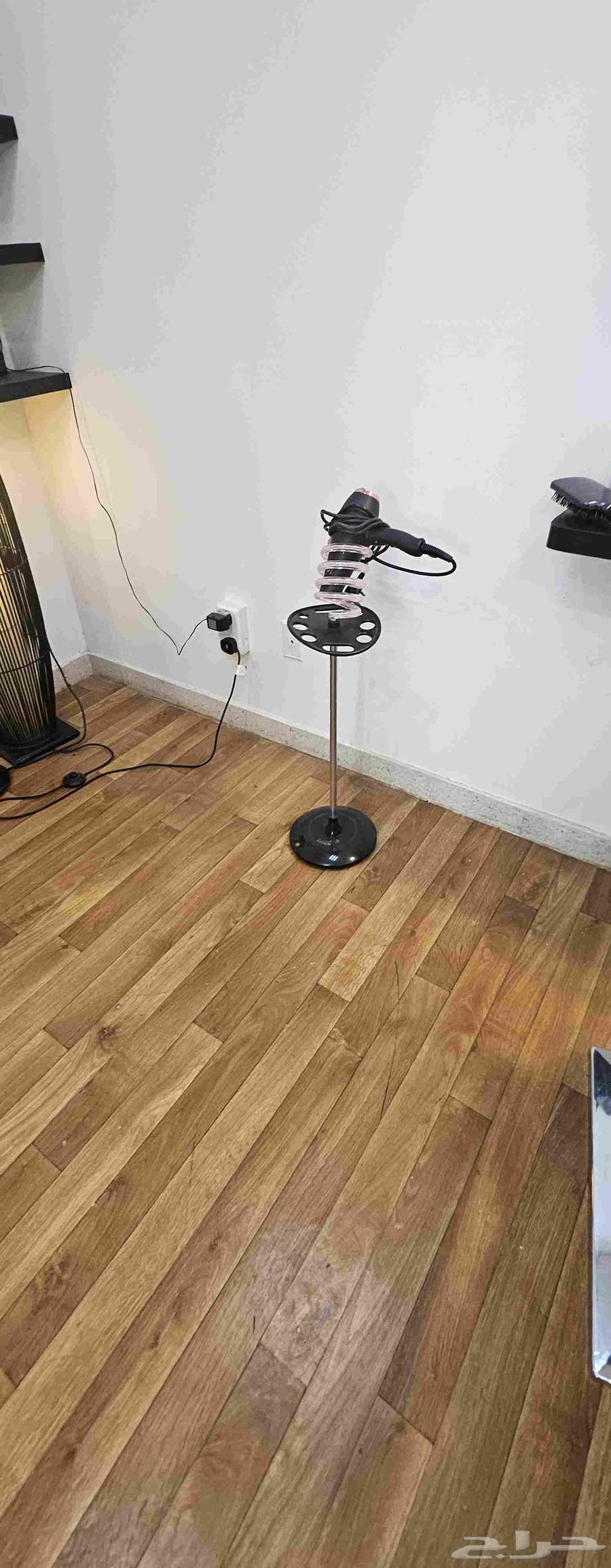 Two women's salon chairs with mirrors, sink, and steam machine64482064308737114