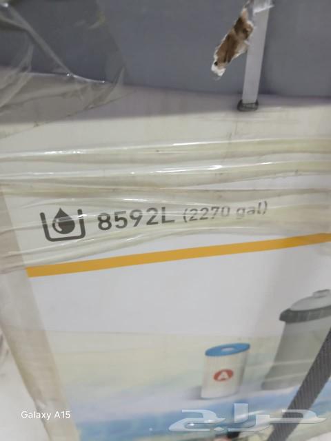 Large swimming pool with filter and ladder64484953563394114