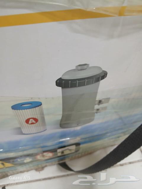 Large swimming pool with filter and ladder64484953563394112