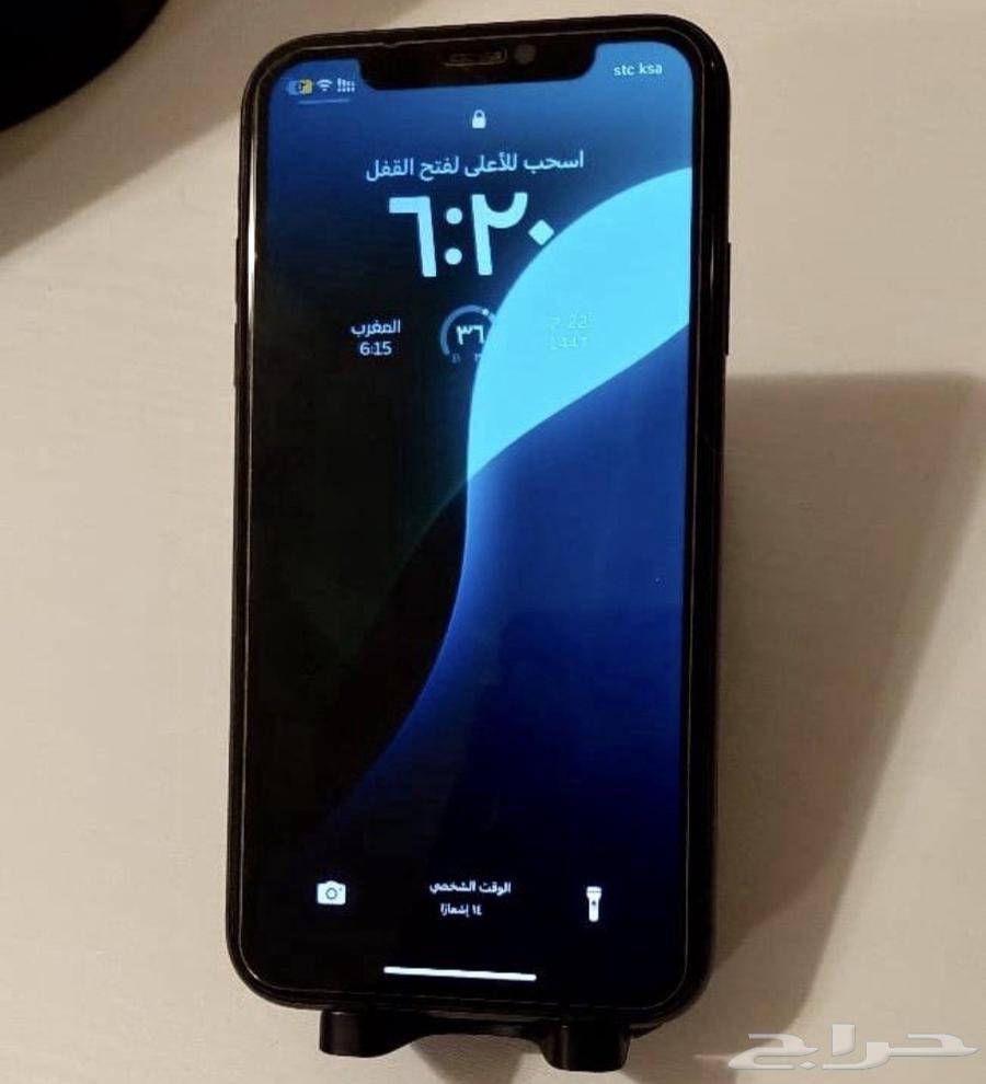 Two phones, one iPhone X regular and the second iPhone 11 new64493259494145110