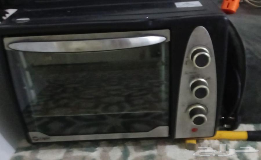 بوتاجاز 4 شعله شغال جيد جدا مع الفرن ميكرويف كبير مع خرطوم ا64490317306114110