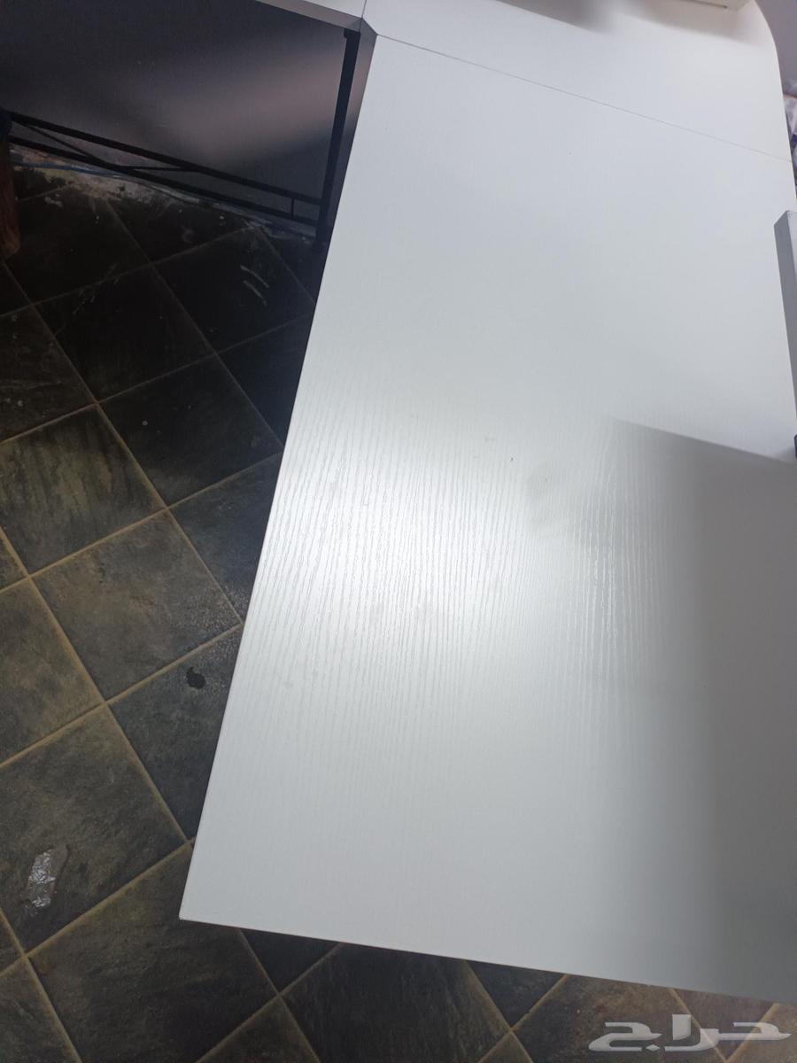 Unused L-shaped dining table64492867263747113