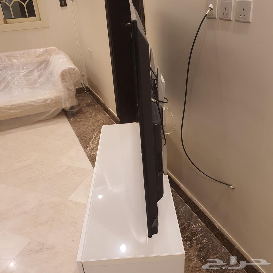 تلفزيون 55 بوصه مع حامل64498340585858111